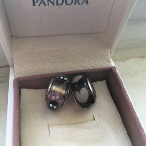 Two Murano Pandora charms.